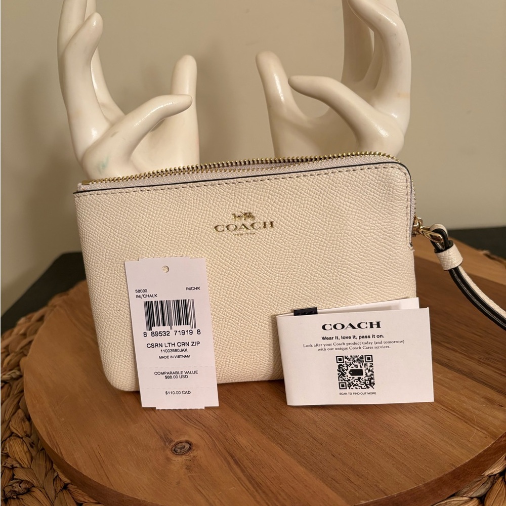 Coach Ivory Wristlet with Gold Accents